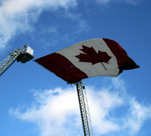 "Canadian Flag flying from Aerials"
